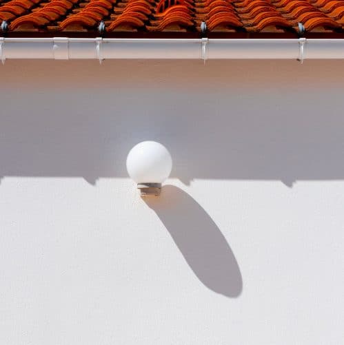 White soffit panel underneath a roof eave